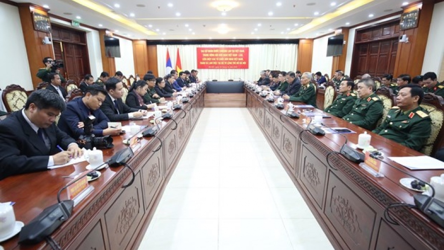 Session highlights special links between Vietnamese, Lao armies