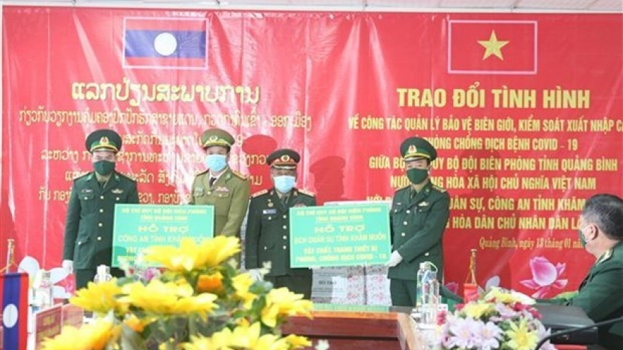 Vietnamese, Lao provinces enhance ties in border defence, COVID-19 fight