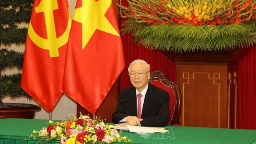 Vietnam, China to enhance substantive cooperation, say top leaders
