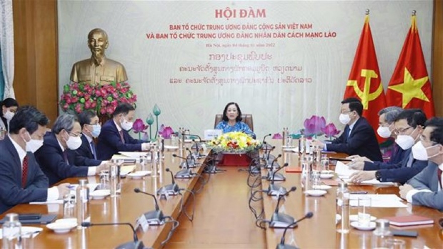 Organisation commissions of Vietnamese, Lao Parties foster cooperation