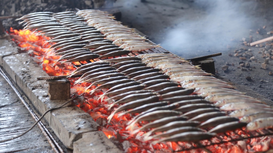 Grilled fish making village busy on scorching summer days