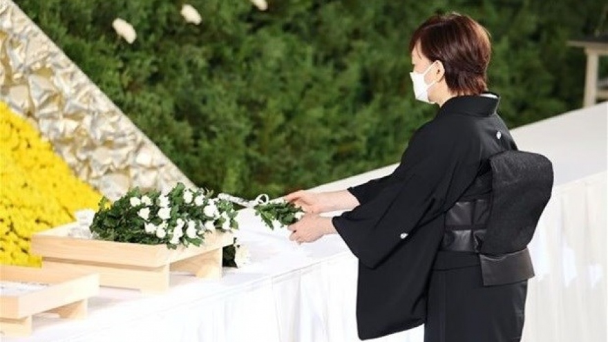President visits, offers condolences to widow of late PM Shinzo Abe