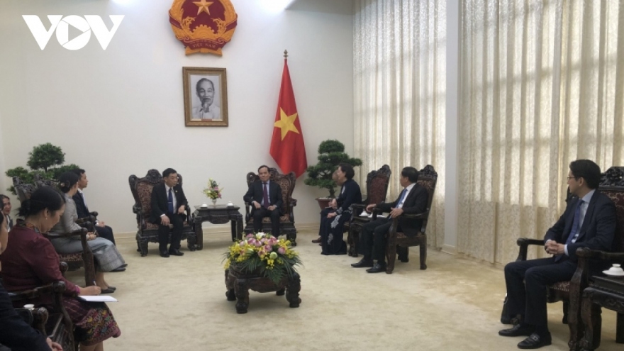 Deputy PM Quang receives Lao Minister of Home Affairs