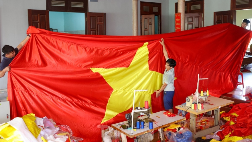 Flag making village in Hanoi busy ahead of National Day celebrations