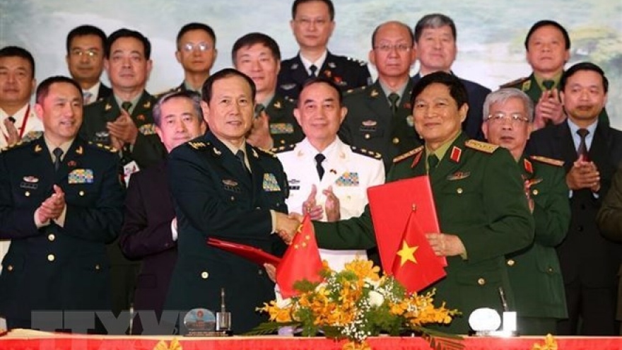 Seminar spotlights Vietnam-China defence friendship exchange