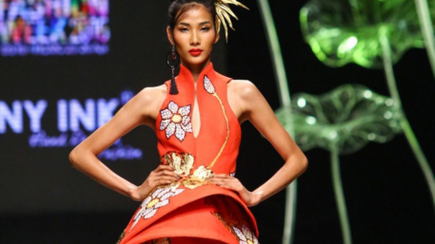 Hoang Thuy in fashion dress inspired by conical hat
