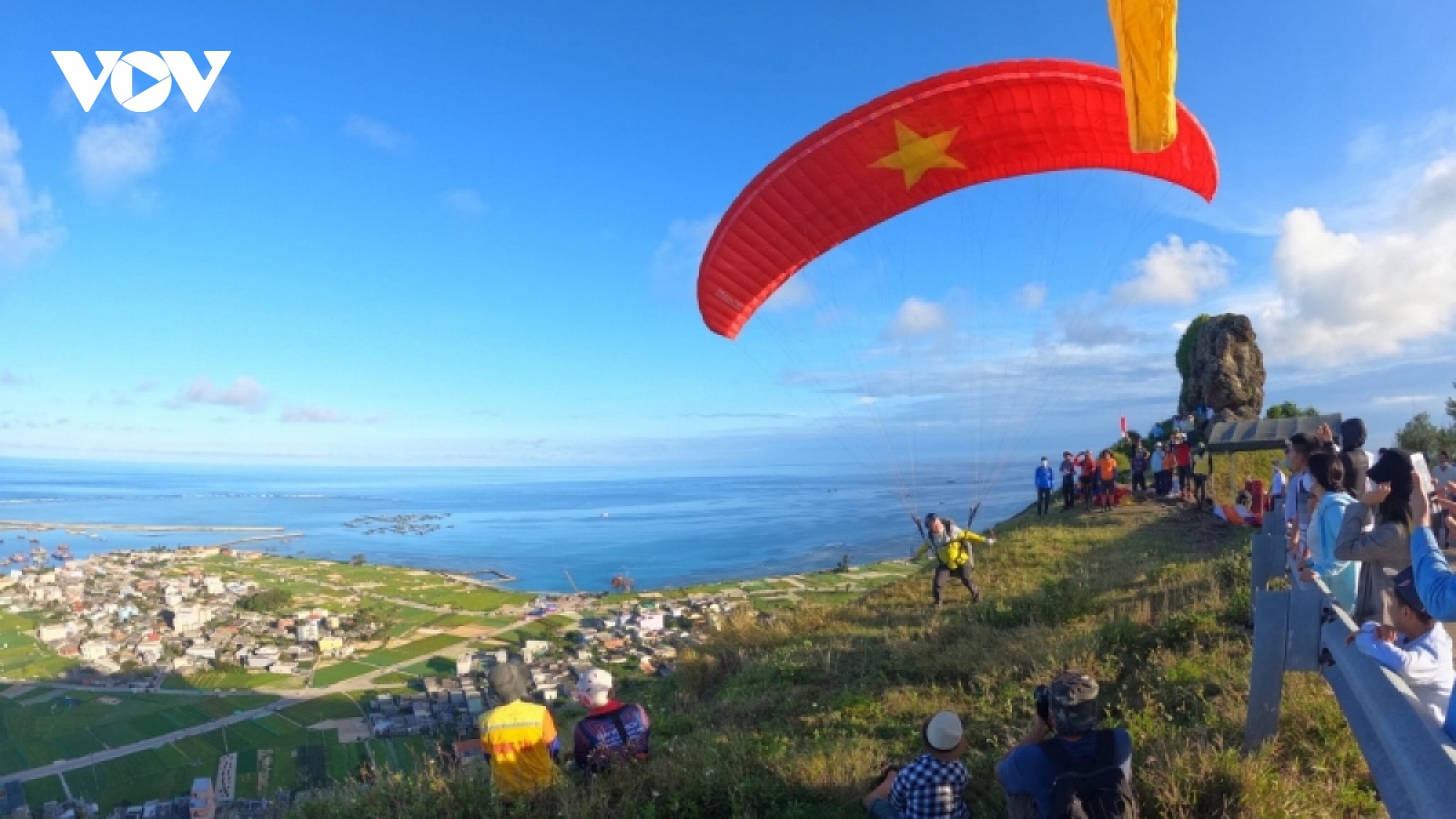 Paragliders fly over Ly Son island