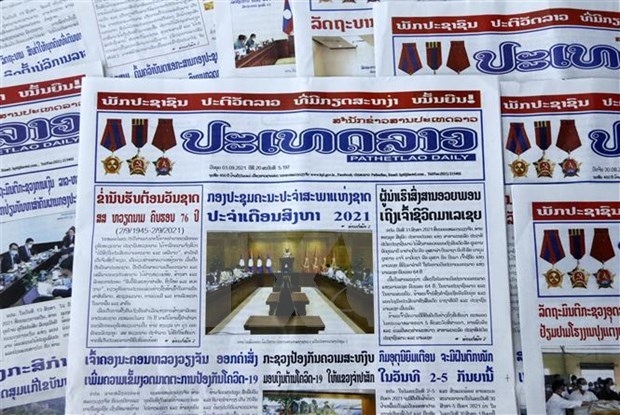 Lao newspaper hails Vietnam's achievements, Laos-Vietnam ties