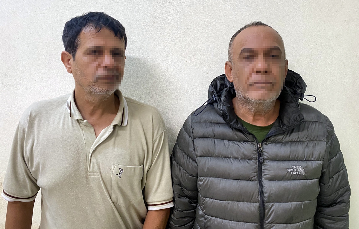 Two foreign men arrested for appropriating property