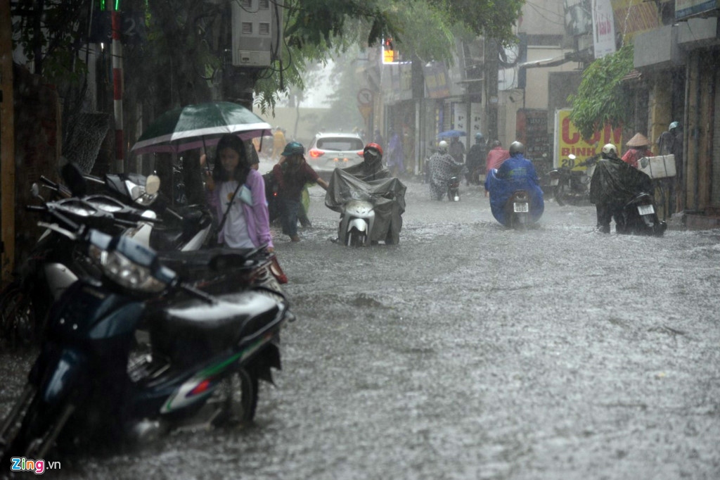 Streets in Hanoi submerged by torrential rain